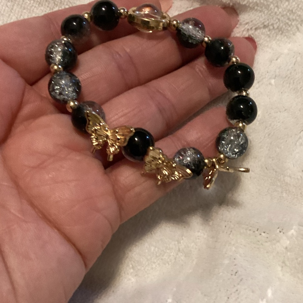 Elegant Gold and Black Butterfly Bracelet - Picture 2 of 5